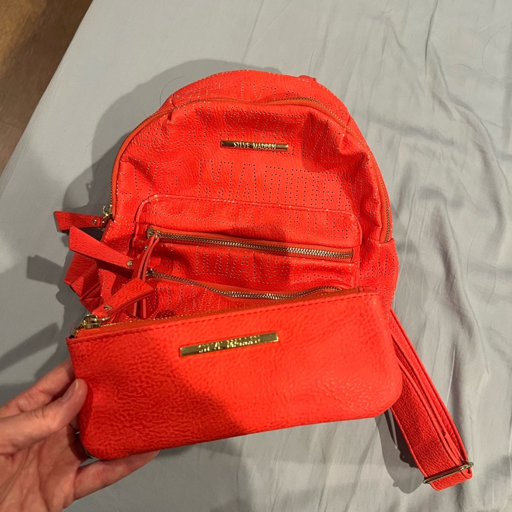 Steve Madden coral mini backpack with matching wallet.